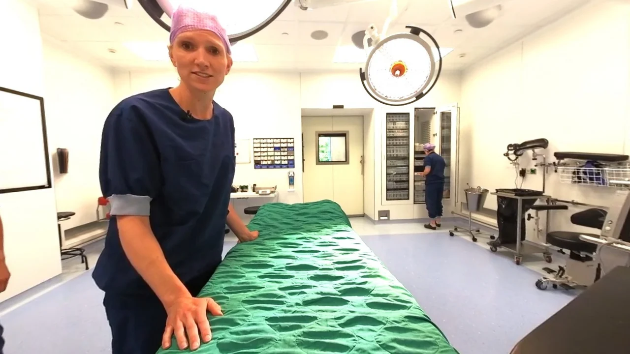Healthcare professionals and operating theatre equipment, seen from a child’s position on the operating table