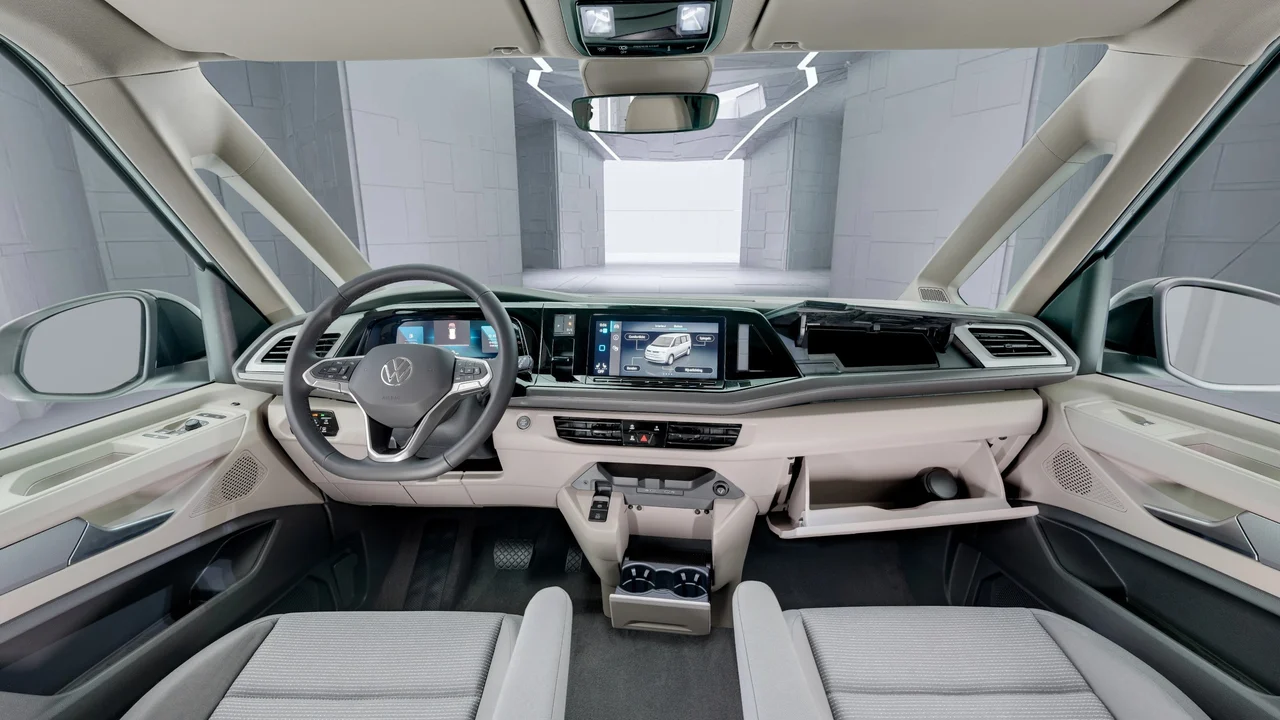 Dashboard and open storage compartments of a Volkswagen Multivan in the Snoeks tour