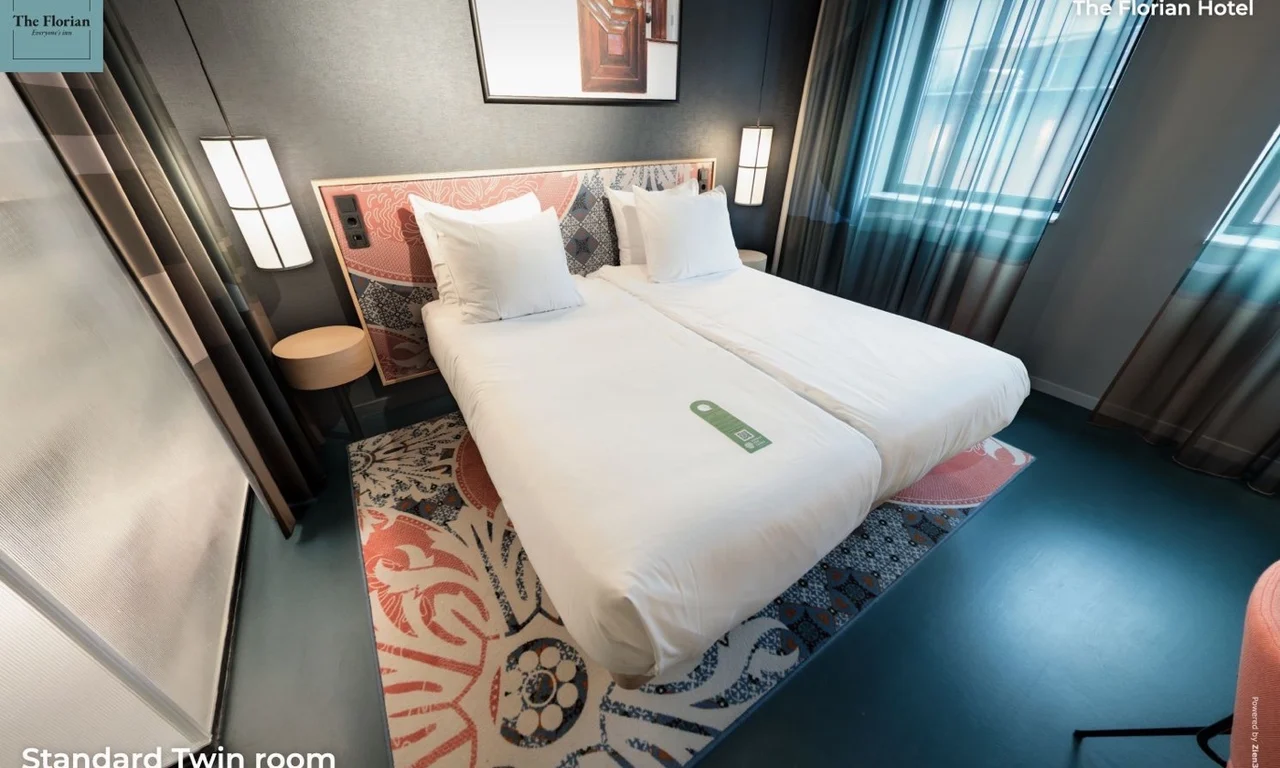 Standard Twin Room at The Florian Hotel with two separate beds and a colourful interior