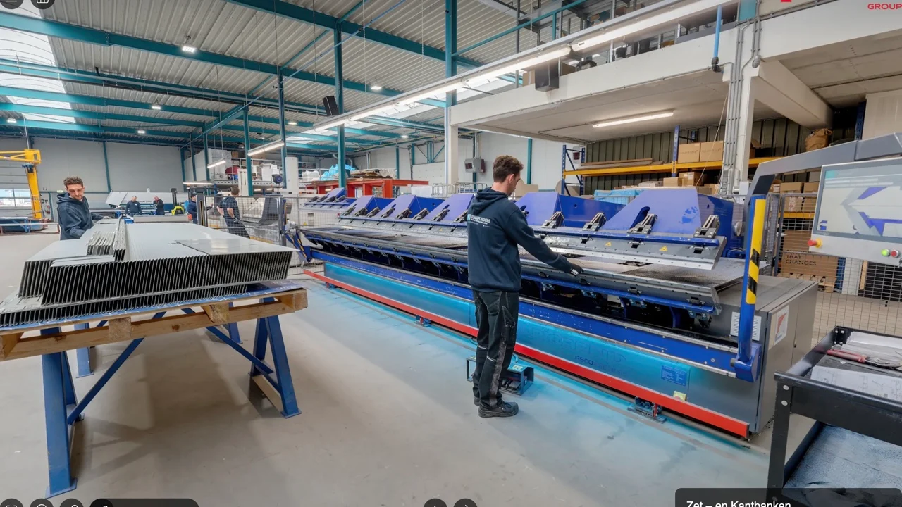 Employees working at press brakes in the TruSteel Group workshop